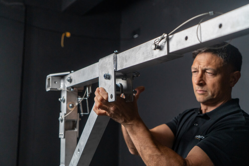 Daniel Cheddie working on stronghold frame